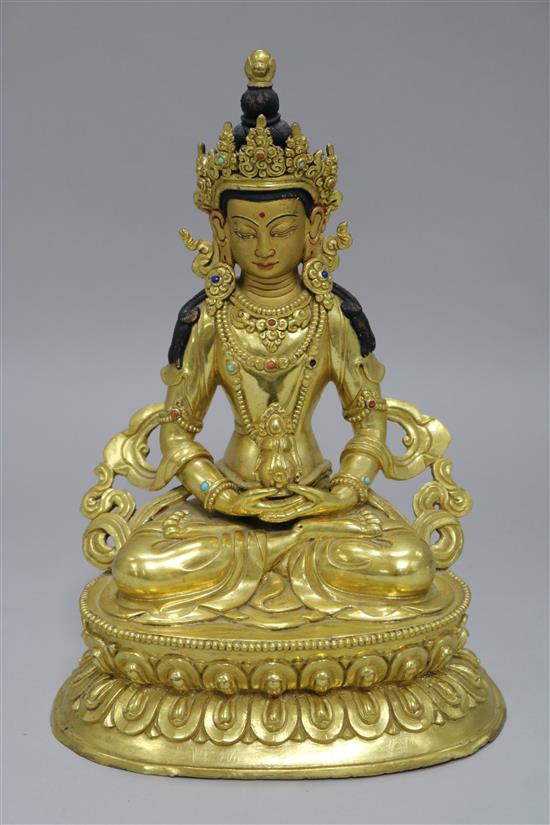A Chinese gilt bronze seated Buddha height 23cm